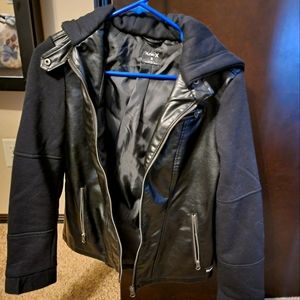 Womens black Hurley faux leather jacket with fleece sleeves and hood.